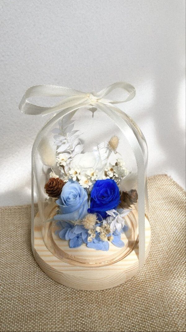 Nautical theme flower glass dome