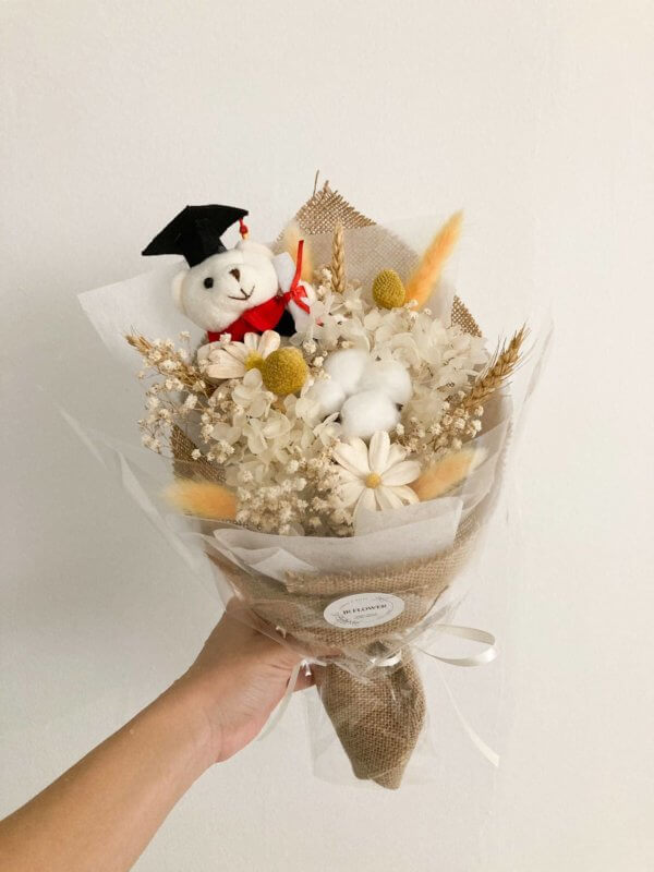 Sunshine flower bouquet with graduation bear