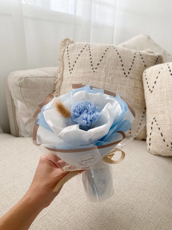 Light blue single carnation flower bouquet