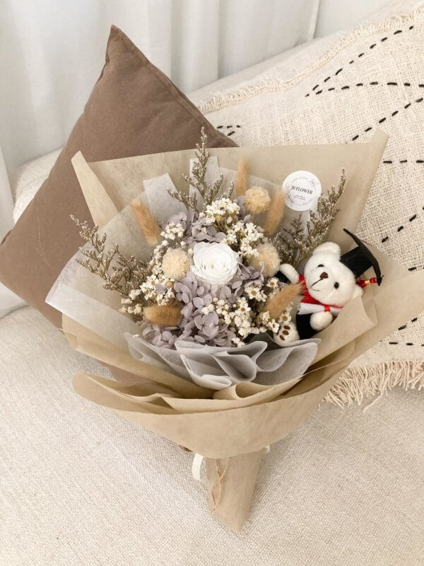 White preserved rose bouquet with bear